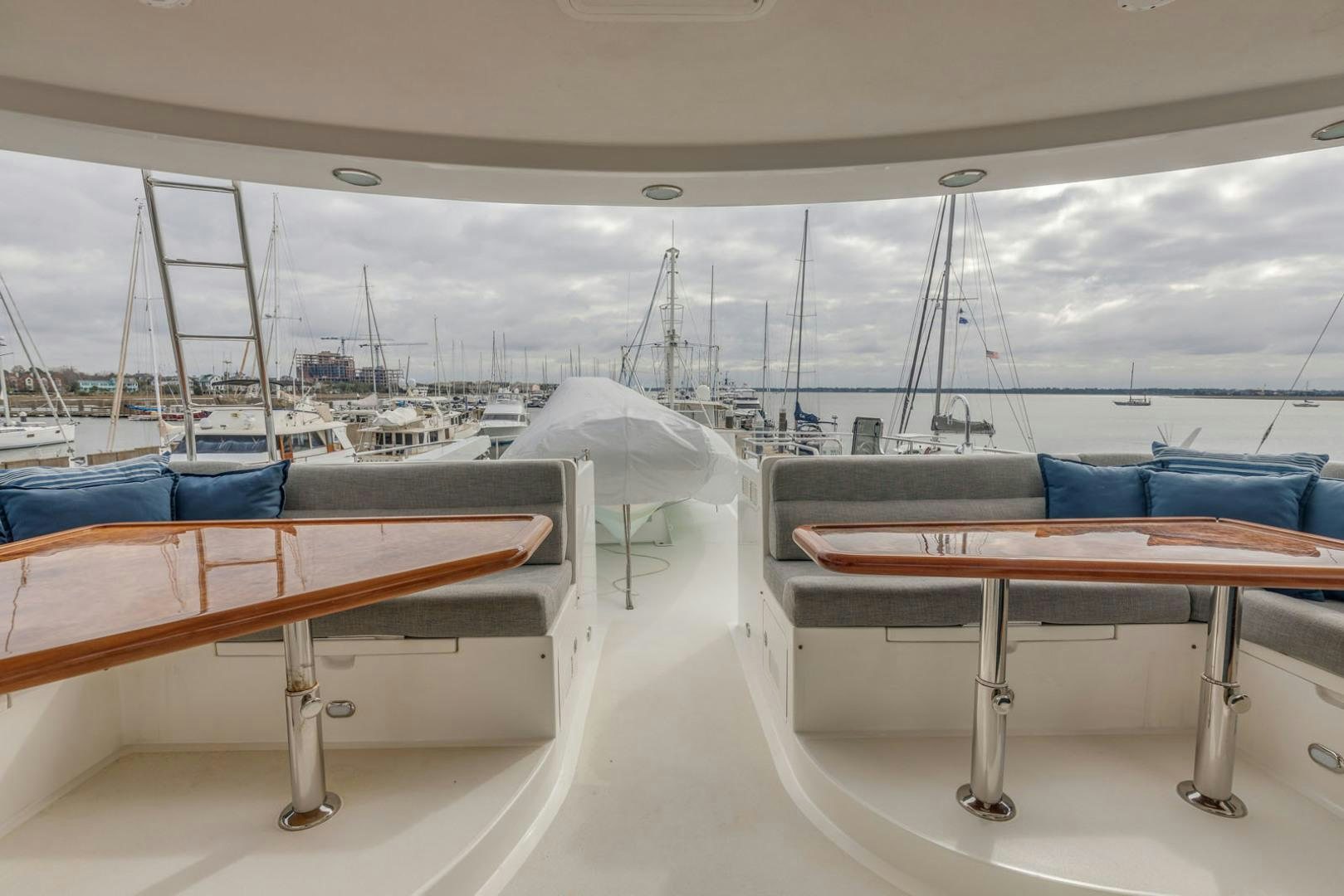 a table and chairs on a boat aboard LADY GIGI Yacht for Sale