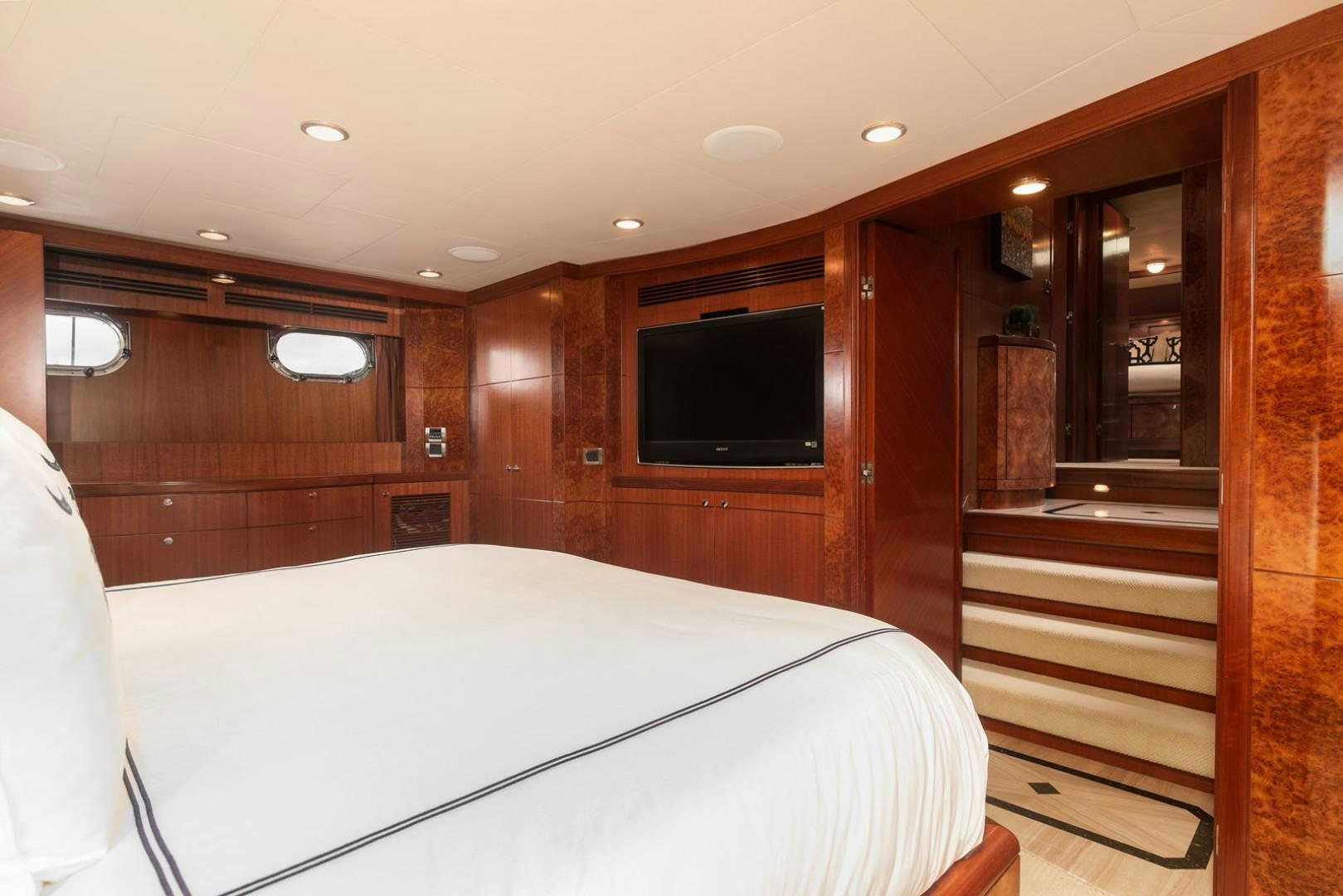 a bed in a room aboard LADY GIGI Yacht for Sale