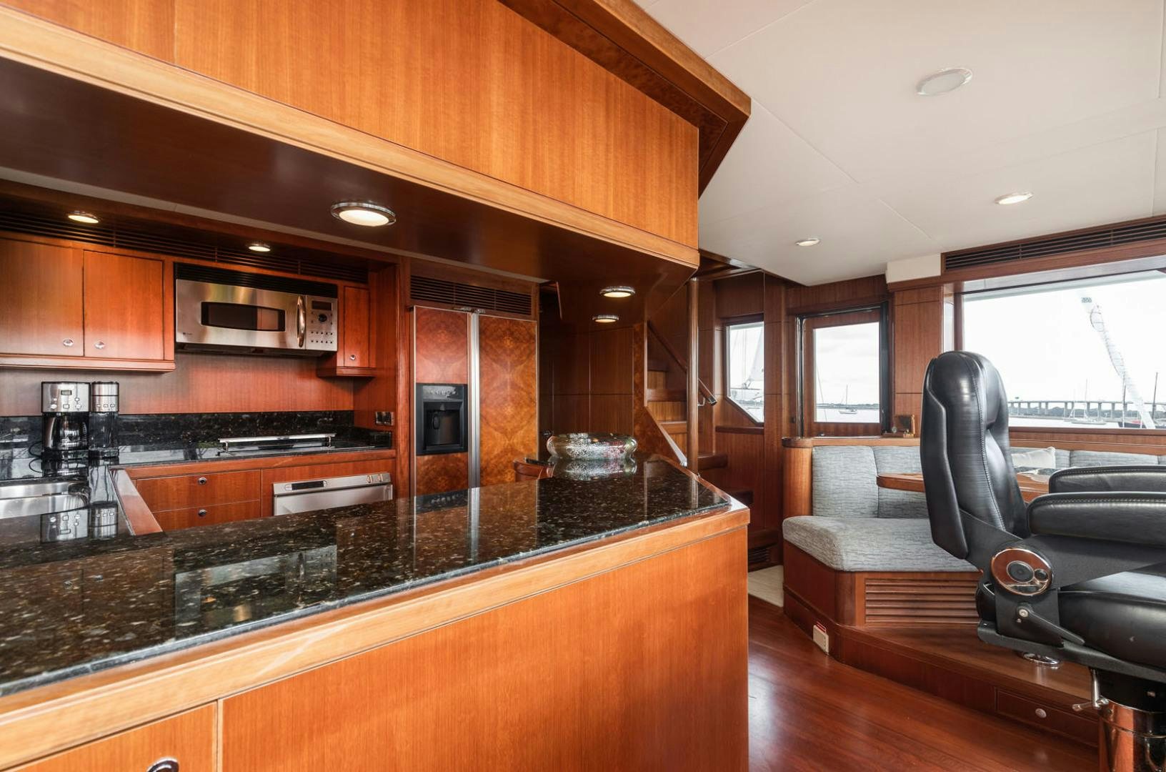 a kitchen with a large island aboard LADY GIGI Yacht for Sale