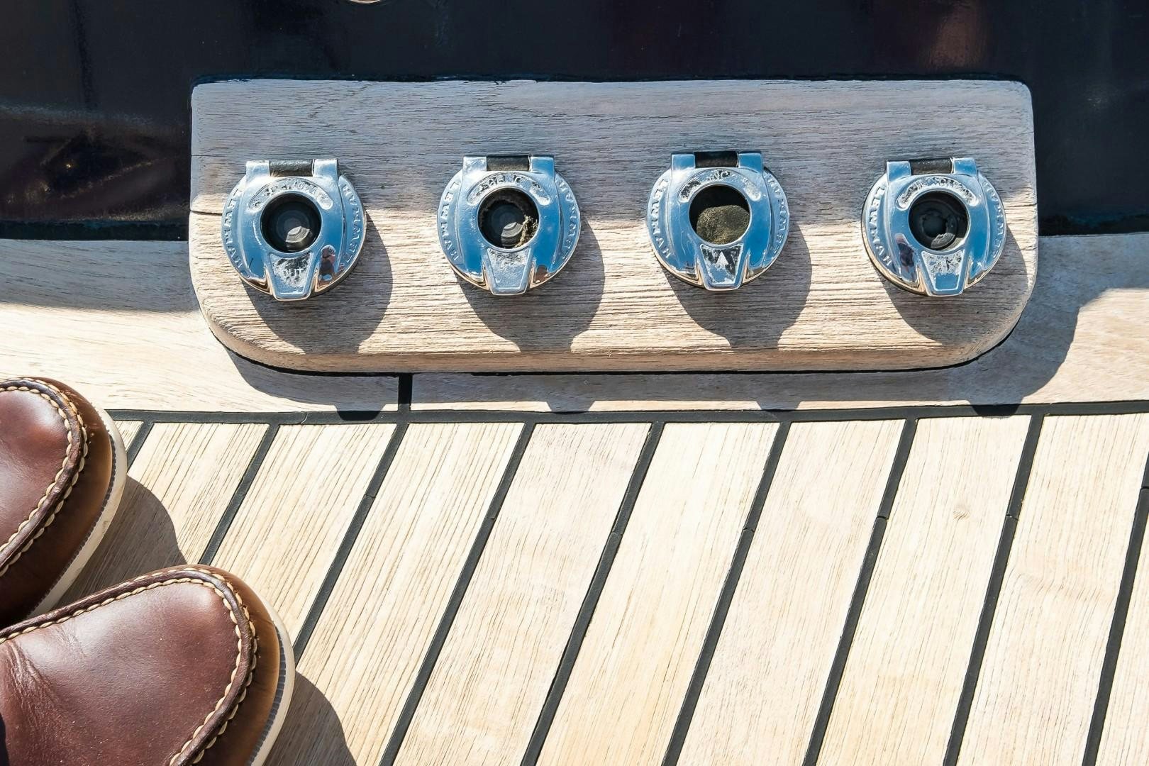 a group of speakers on a table aboard ARQUIMEDES Yacht for Sale