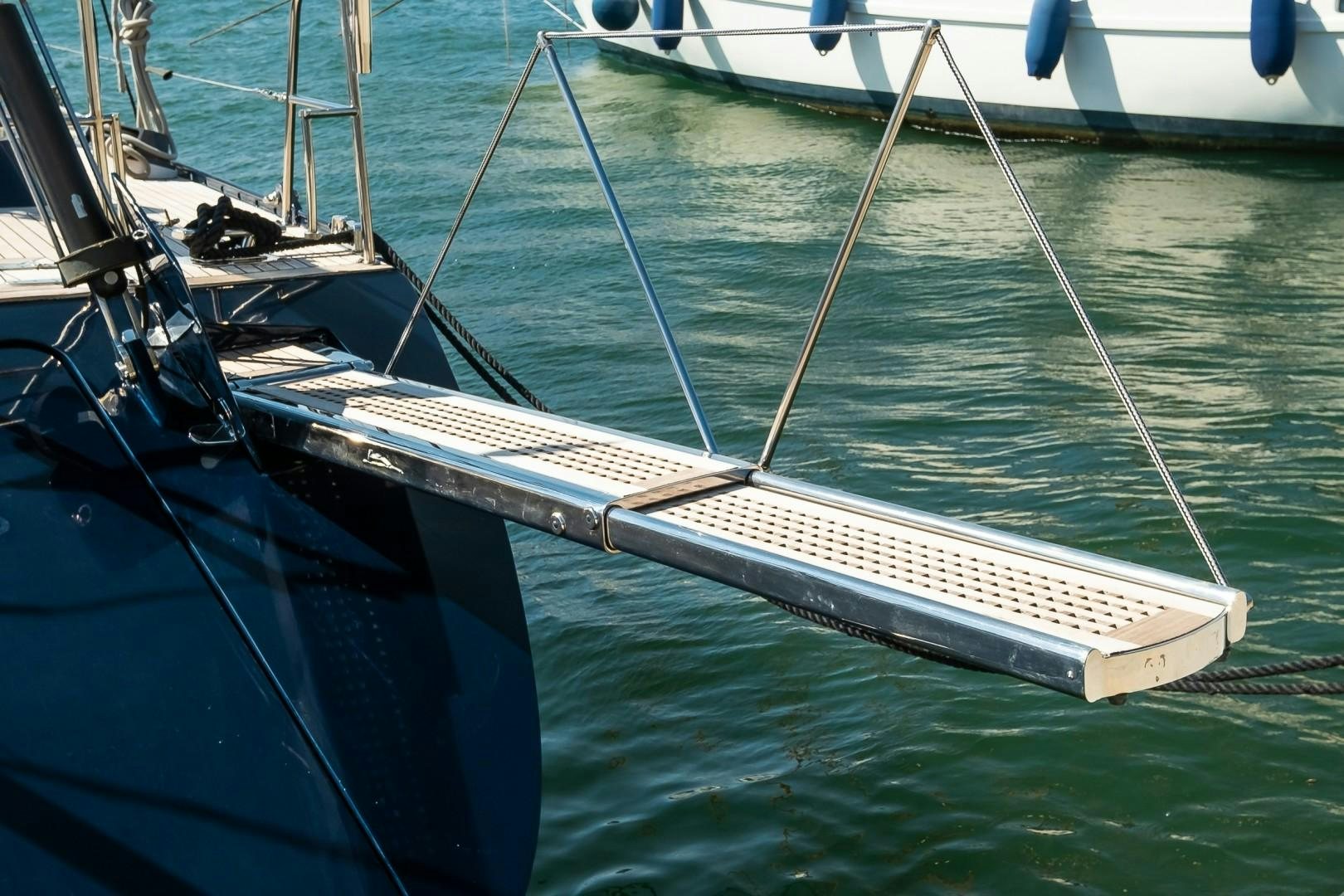 a row of boats on a body of water aboard ARQUIMEDES Yacht for Sale
