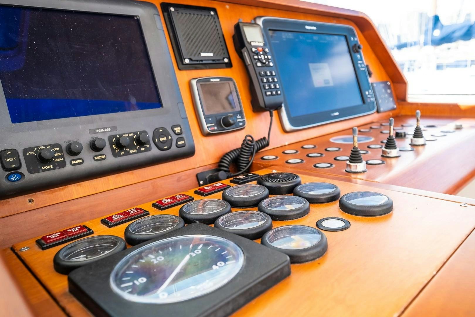a machine with buttons and a screen aboard ARQUIMEDES Yacht for Sale