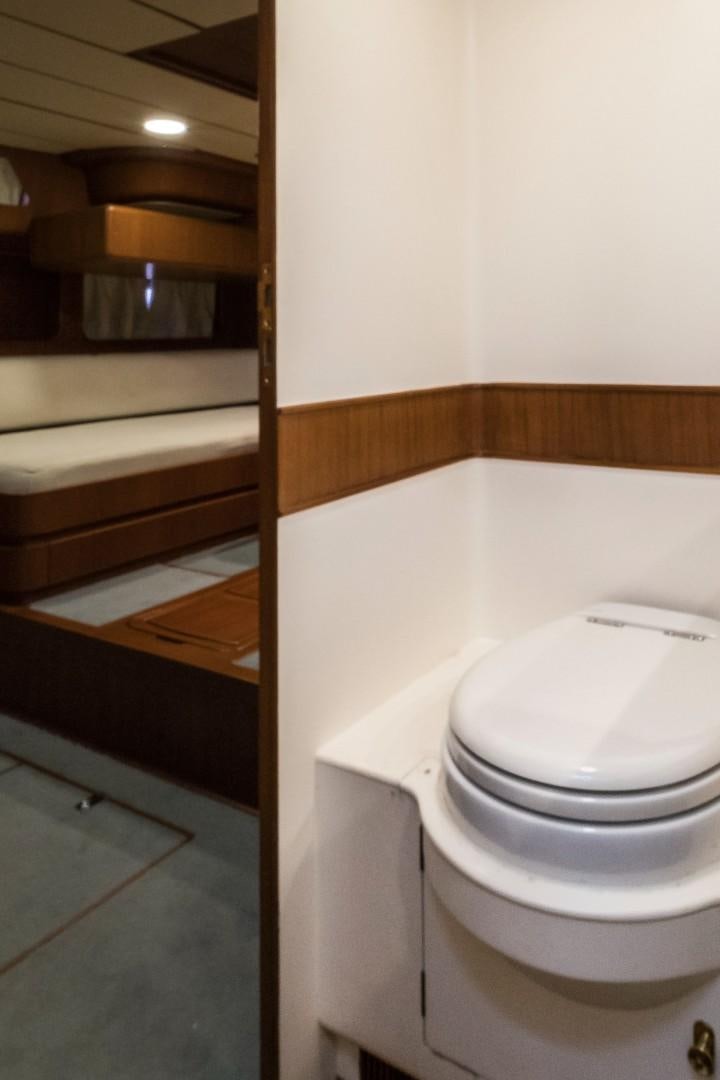 a bathroom with a toilet and a sink aboard ARQUIMEDES Yacht for Sale