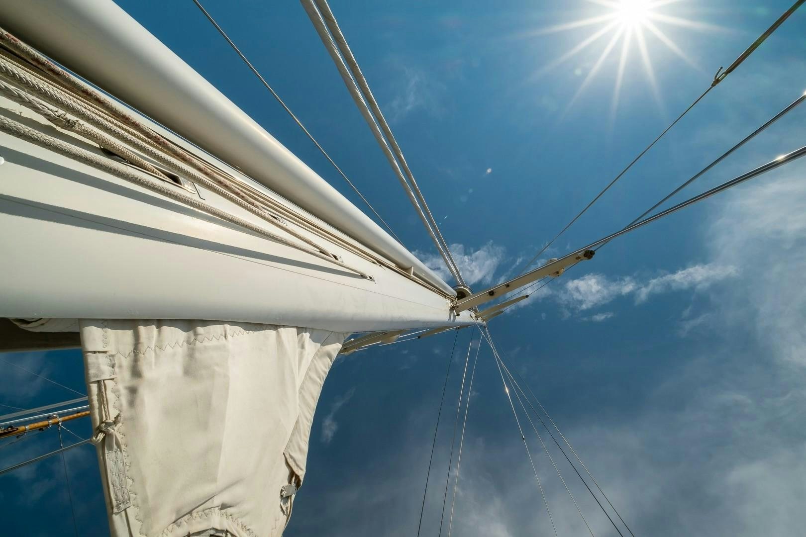 a white building with a white sheet aboard ARQUIMEDES Yacht for Sale
