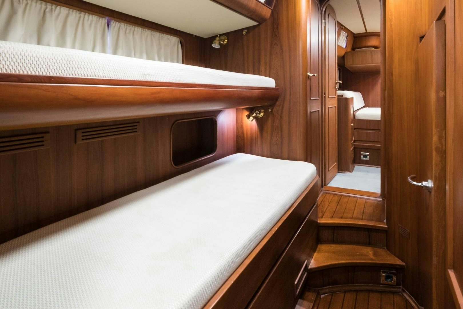 a large white bathtub in a wooden room aboard ARQUIMEDES Yacht for Sale