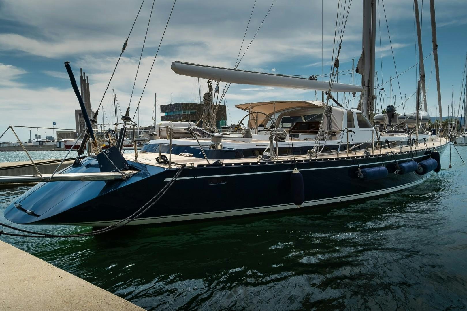 a boat docked at a pier aboard ARQUIMEDES Yacht for Sale