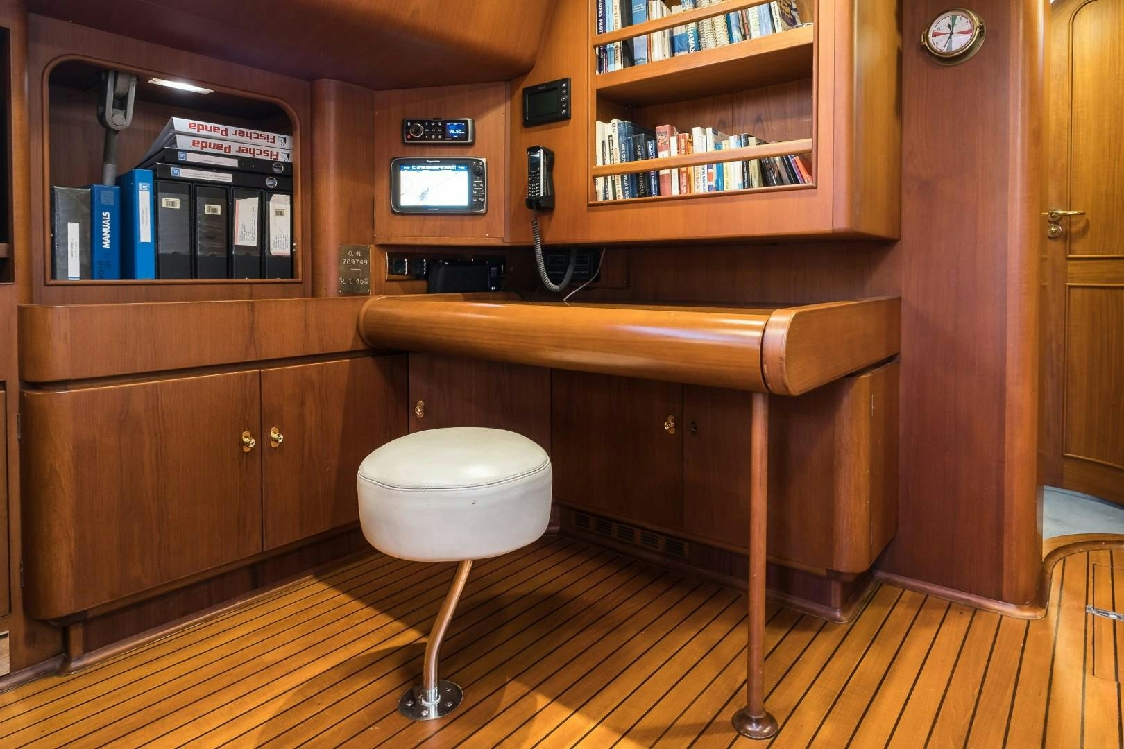 a wooden desk with a toilet aboard ARQUIMEDES Yacht for Sale