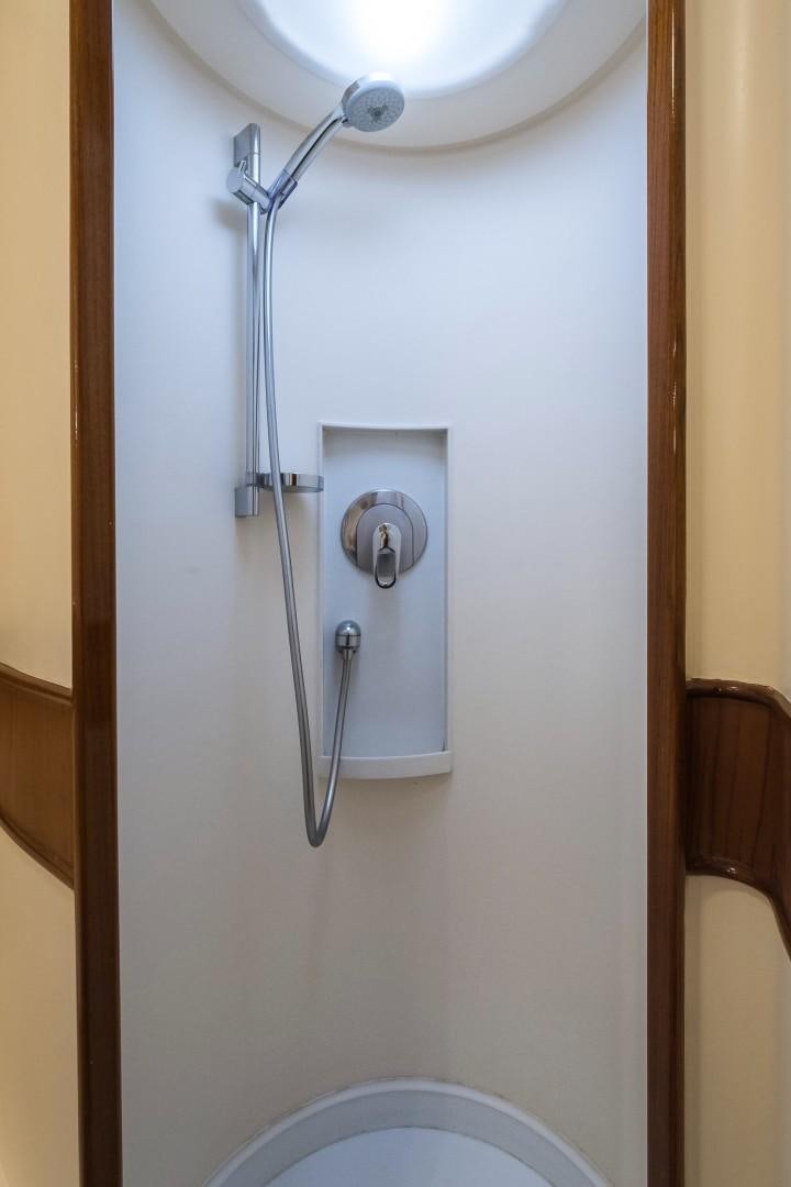 a white wall with a light fixture aboard ARQUIMEDES Yacht for Sale