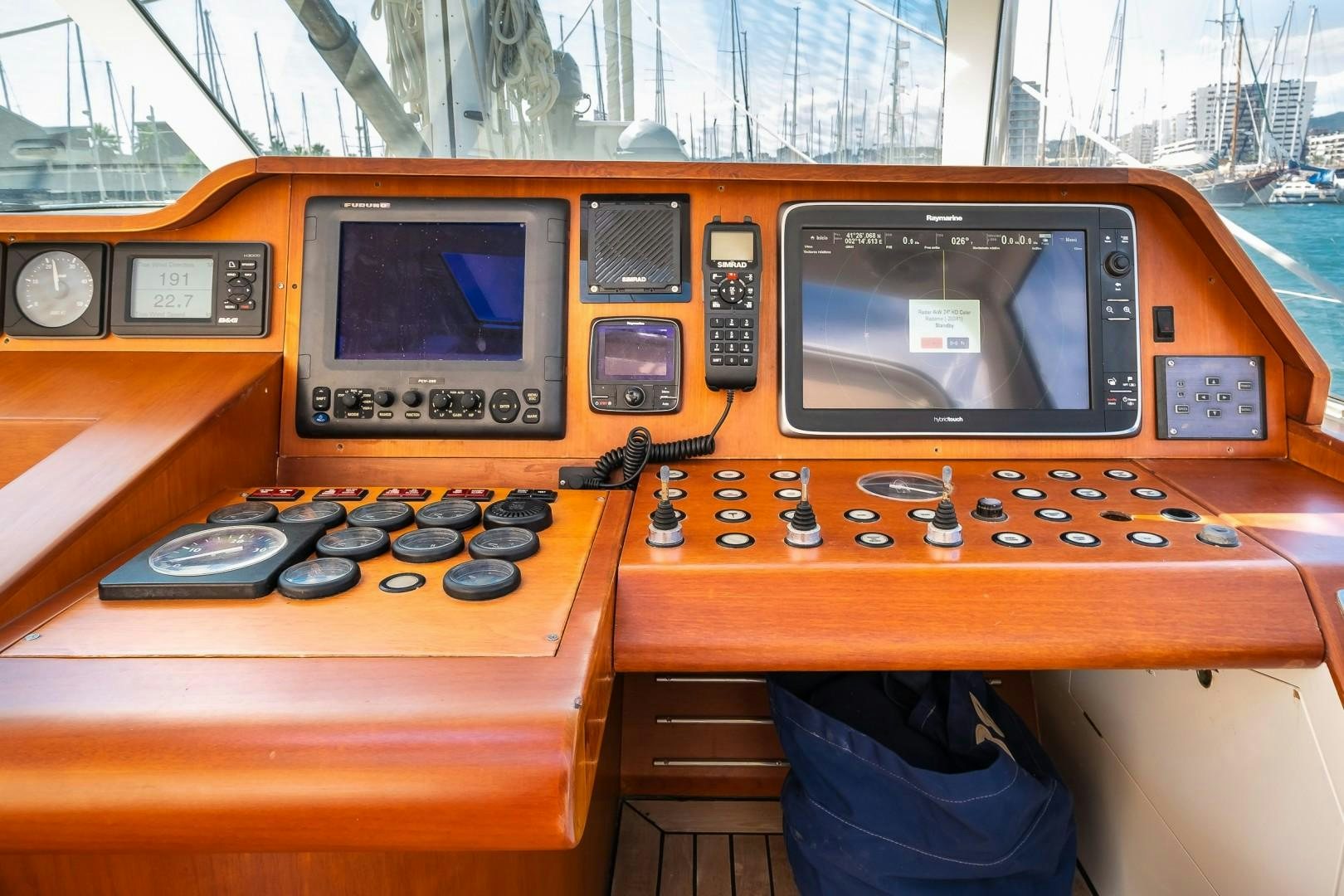 a control panel with a tv and a video game console aboard ARQUIMEDES Yacht for Sale