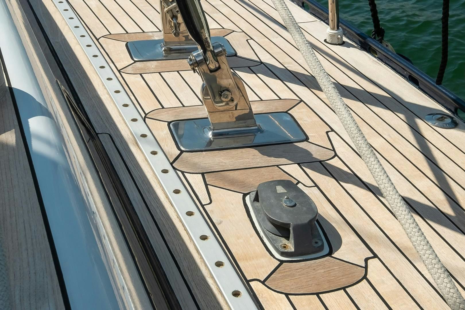 a metal contraption on a wooden surface aboard ARQUIMEDES Yacht for Sale