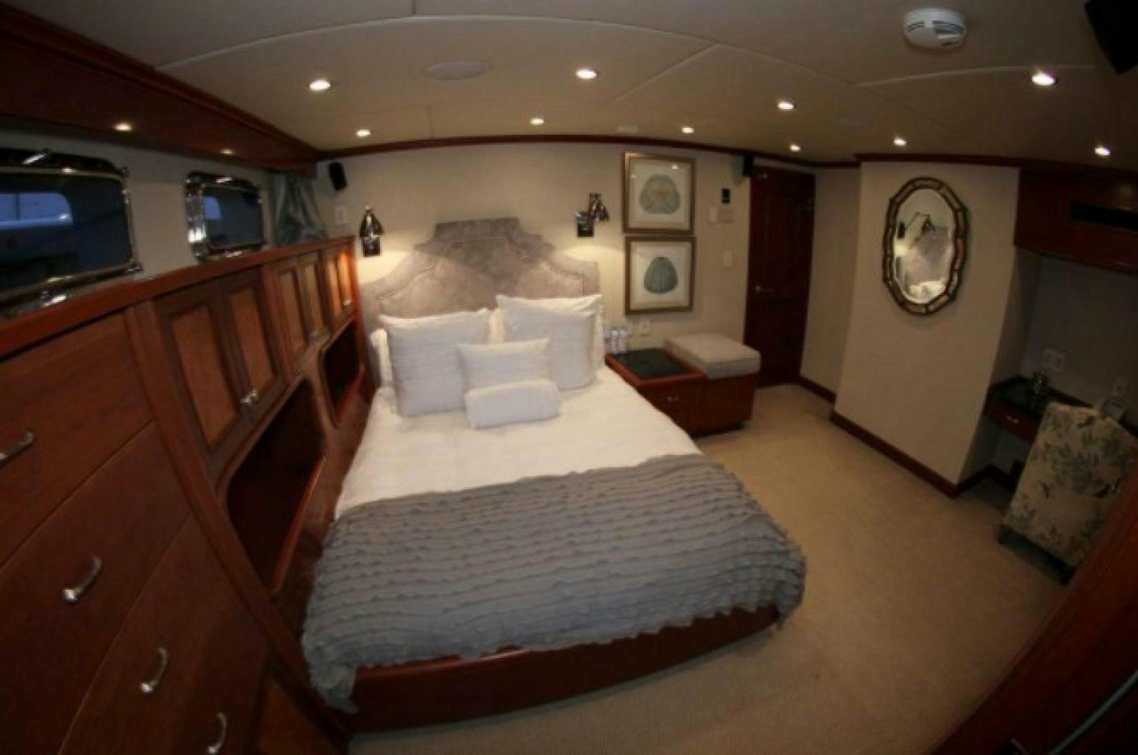 a hotel room with a bed aboard HURACAN Yacht for Sale
