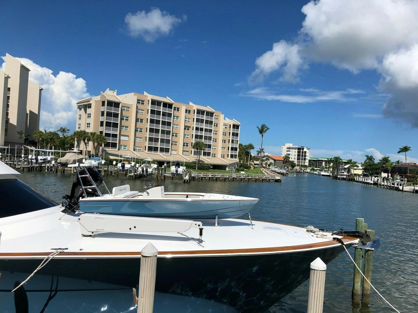 a boat docked at a pier aboard Renegade Yacht for Sale