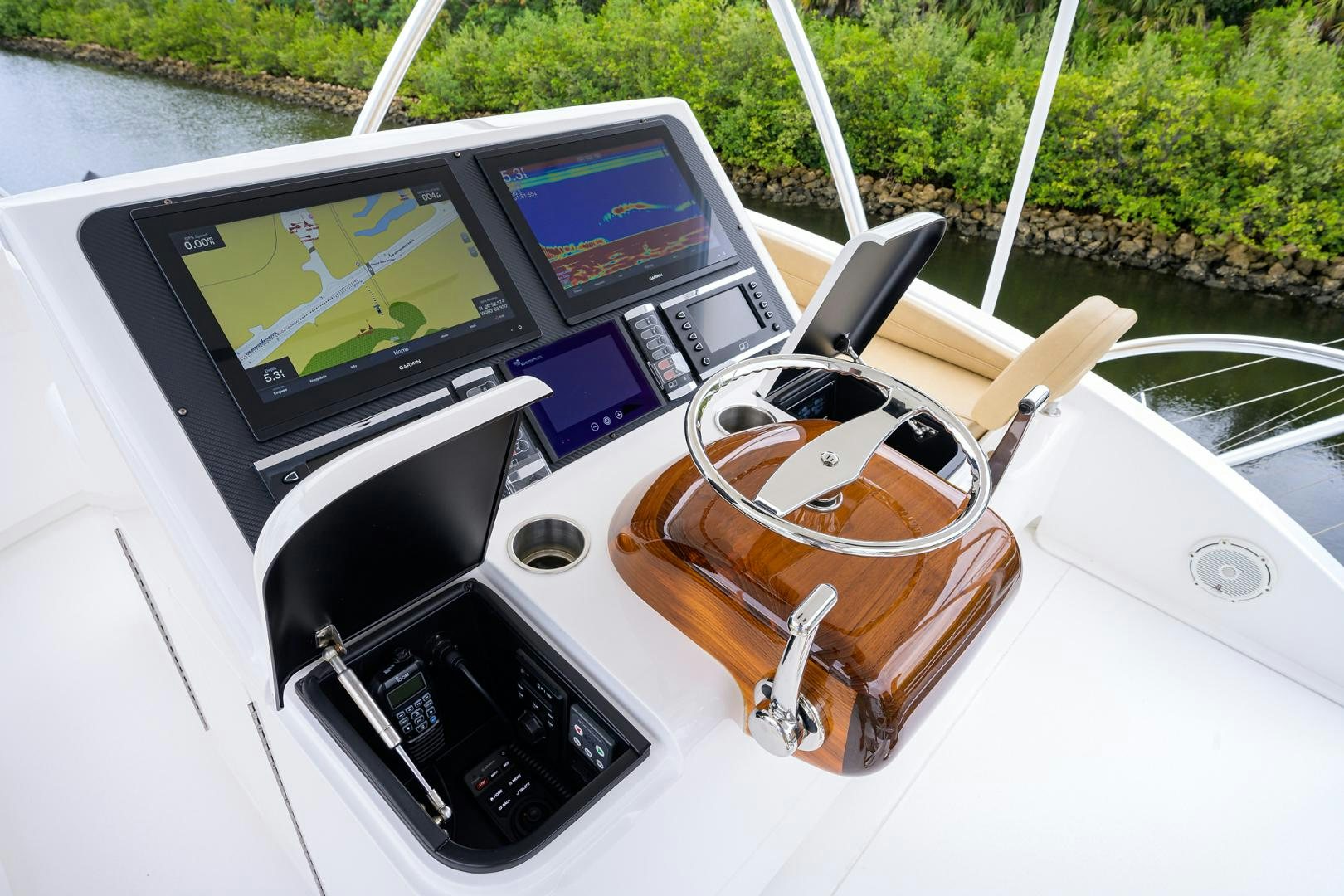 a cup of coffee on a car aboard Renegade Yacht for Sale