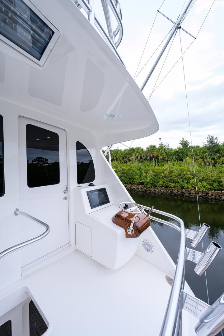 a boat with a handlebar aboard Renegade Yacht for Sale