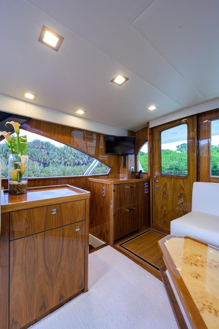 a kitchen with a large glass window aboard Renegade Yacht for Sale