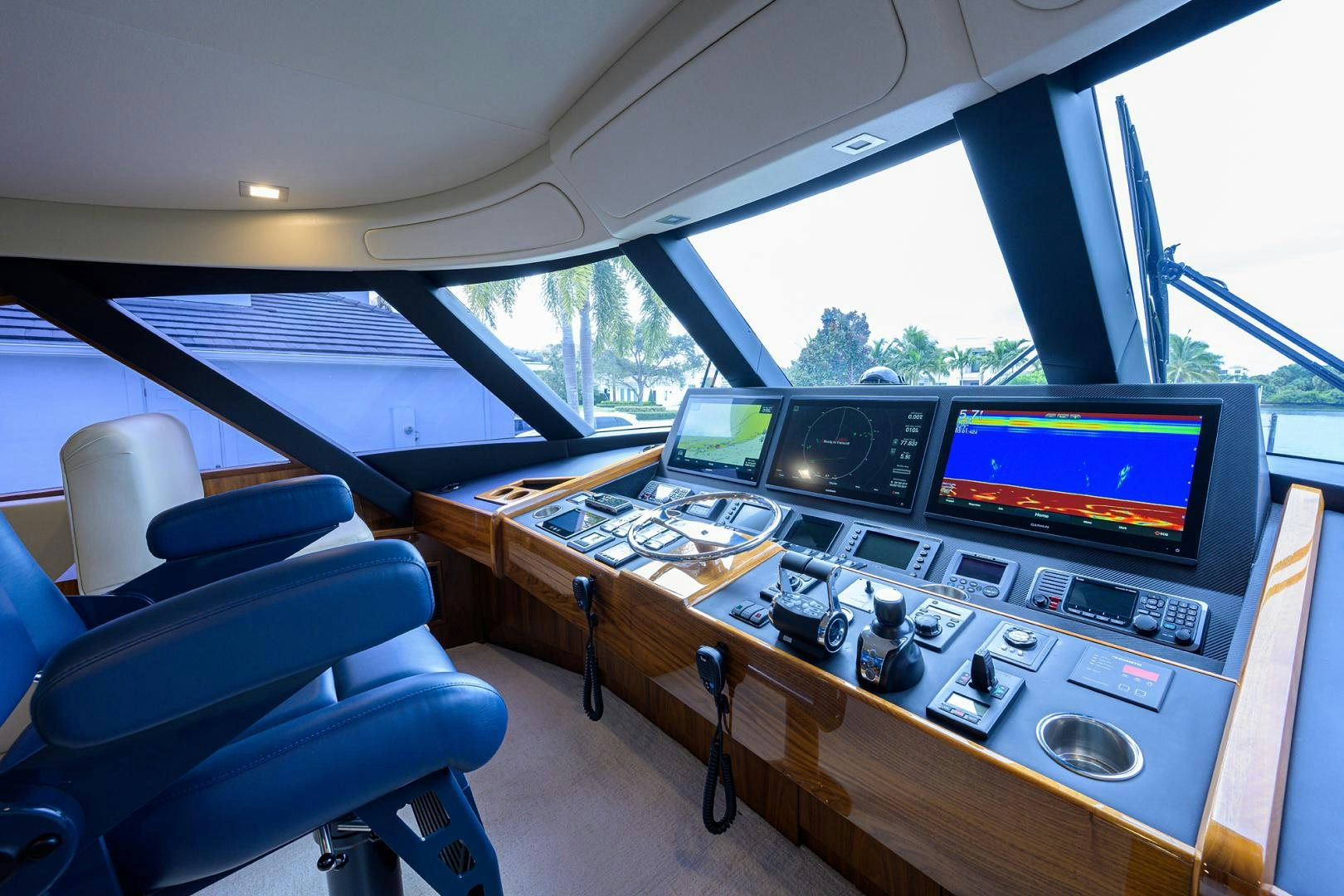 a car with a computer and monitor aboard Renegade Yacht for Sale