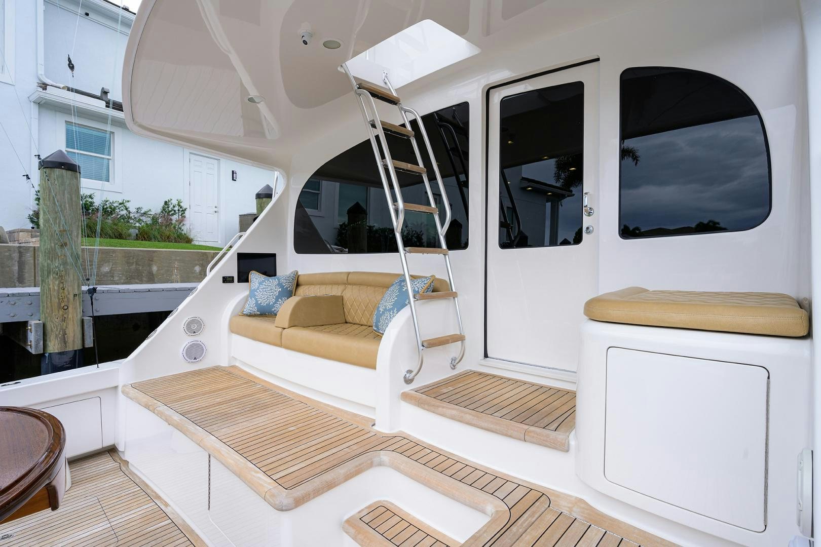 a room with a bed and a couch aboard Renegade Yacht for Sale
