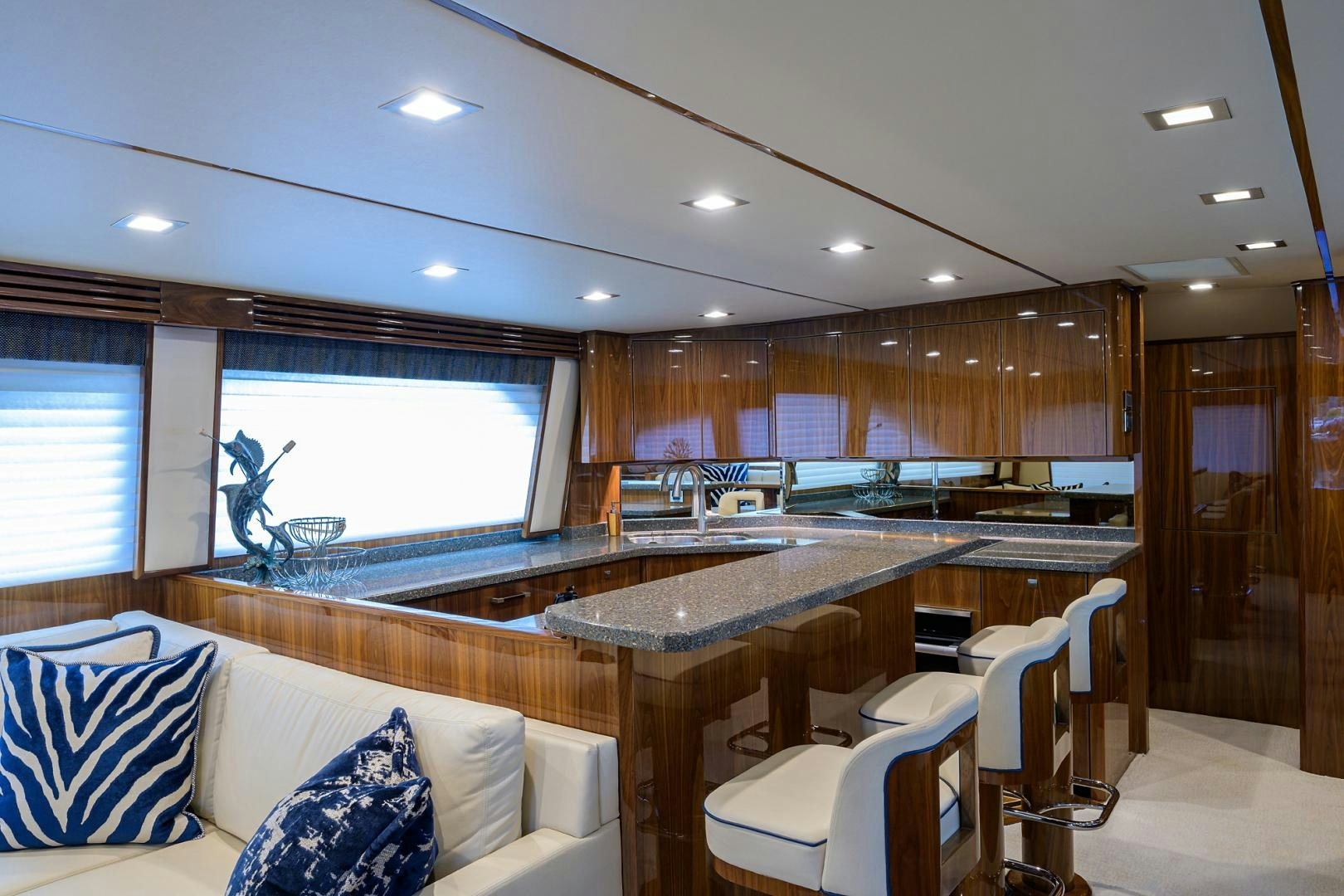 a large kitchen with a large island aboard Renegade Yacht for Sale