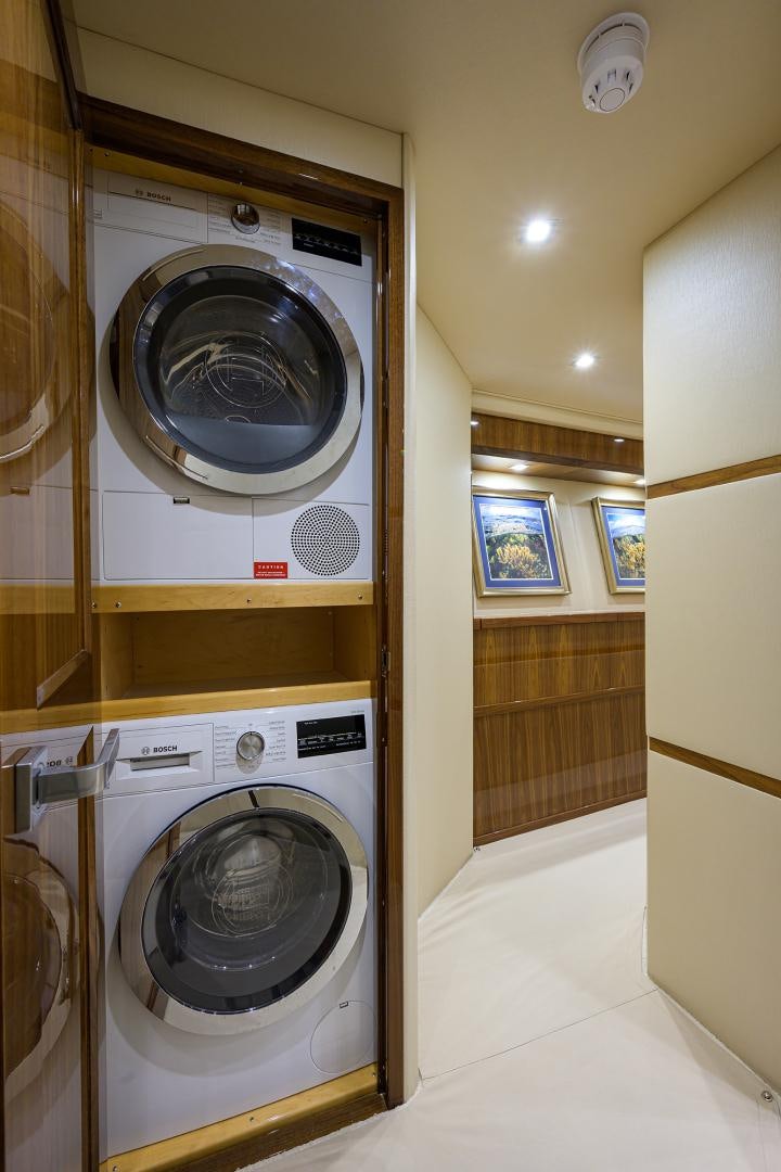 a washing machine in a room aboard Renegade Yacht for Sale