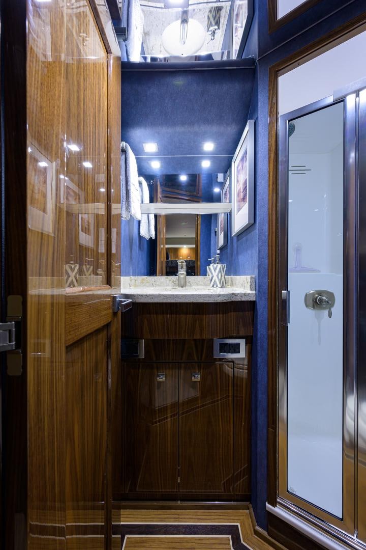 a bathroom with a sink and a mirror aboard Renegade Yacht for Sale