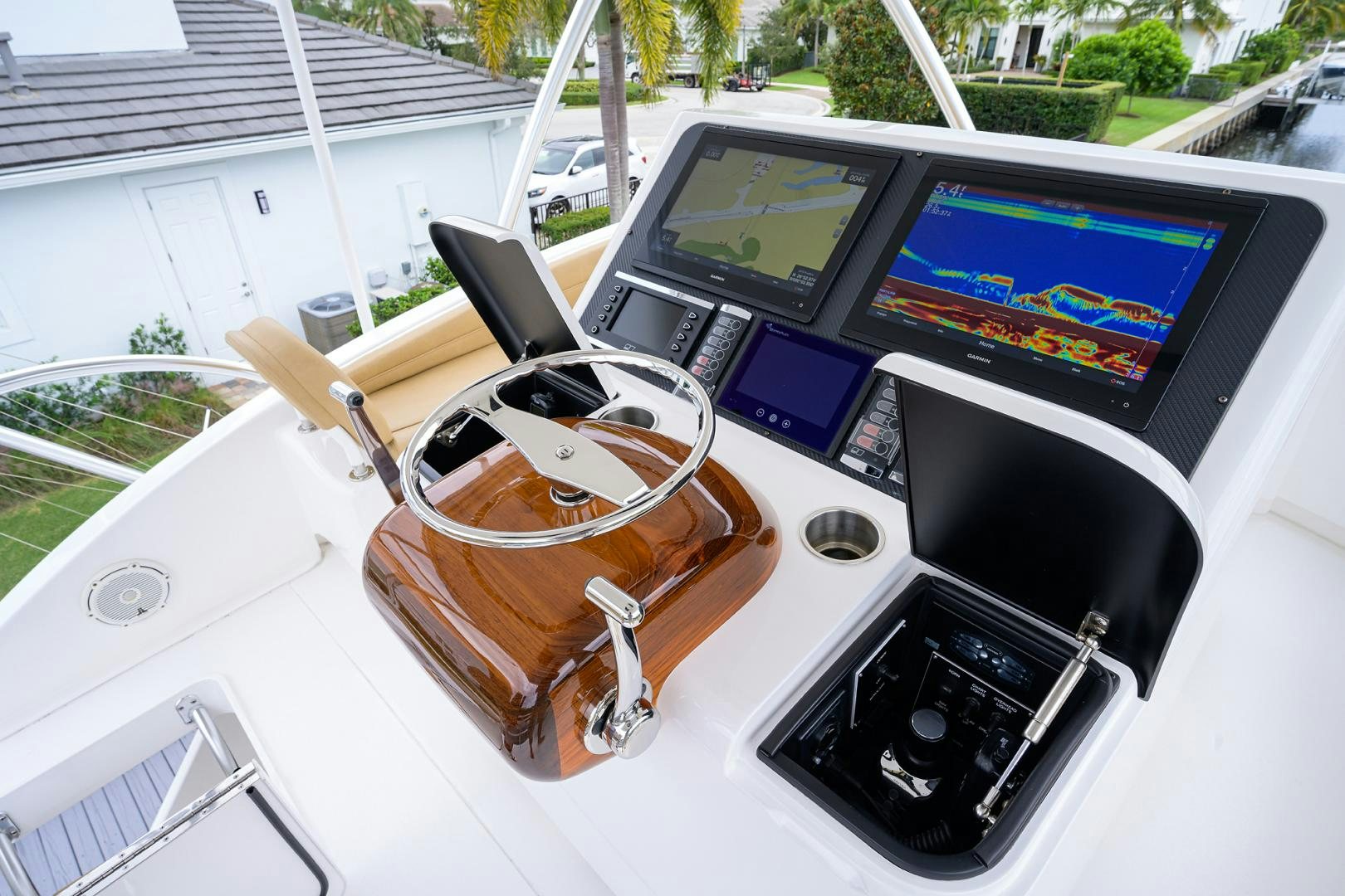 a cup of coffee on a car aboard Renegade Yacht for Sale