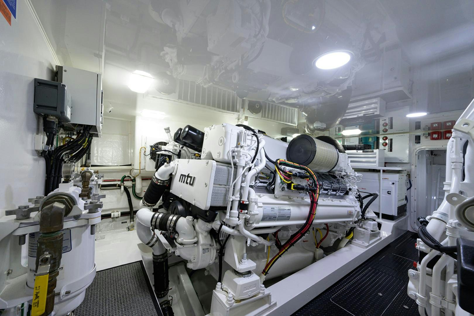 a room with machinery aboard Renegade Yacht for Sale