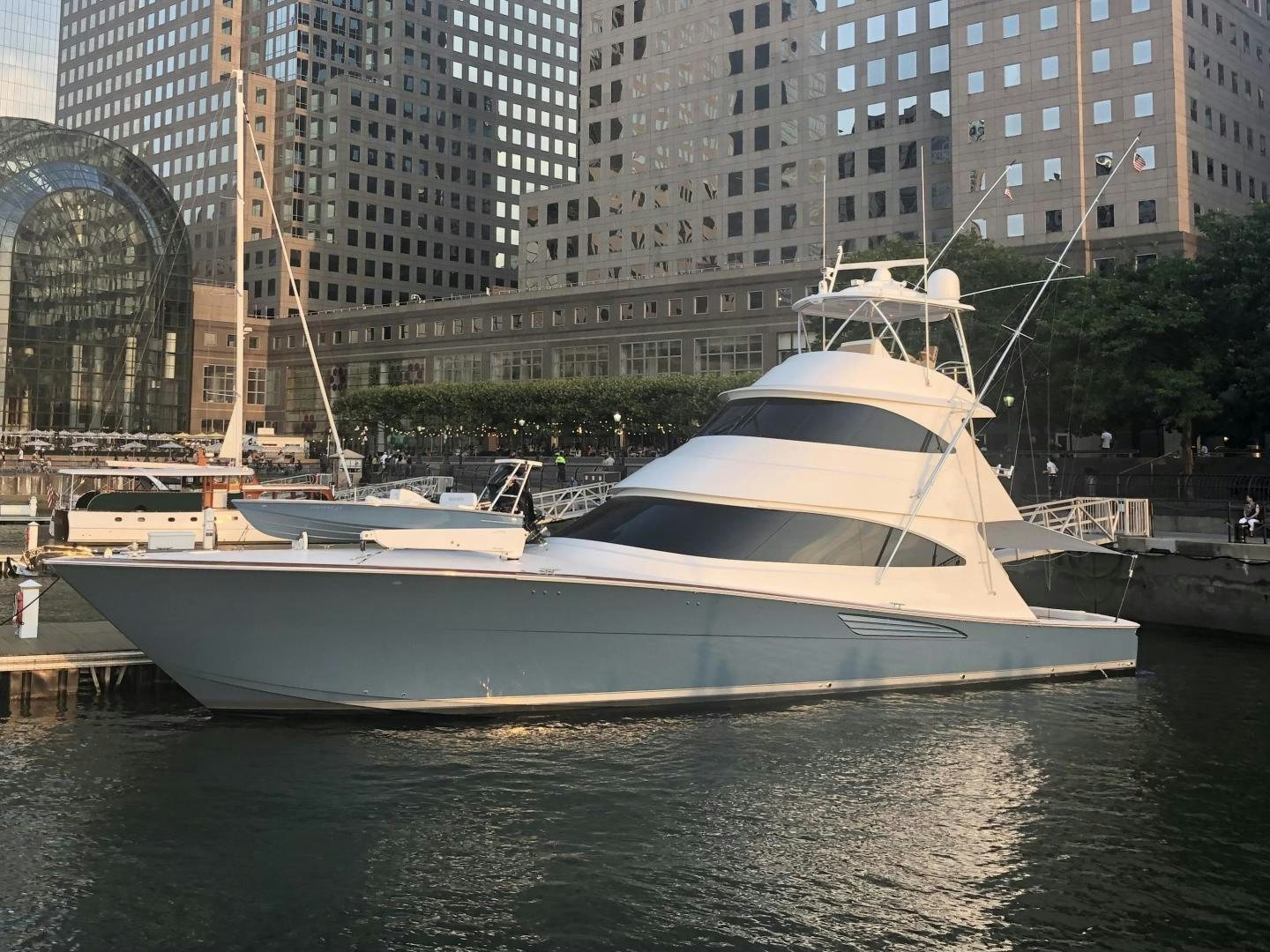 a boat docked at a pier aboard Renegade Yacht for Sale