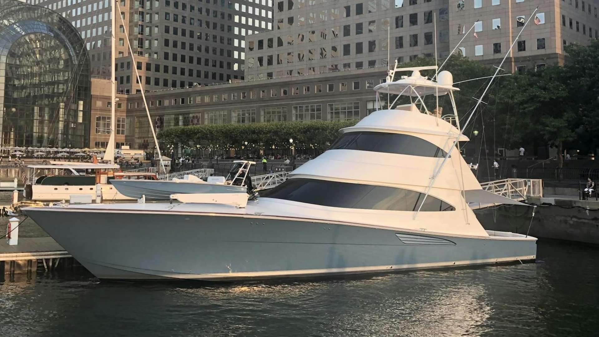 a boat docked at a pier aboard Renegade Yacht for Sale