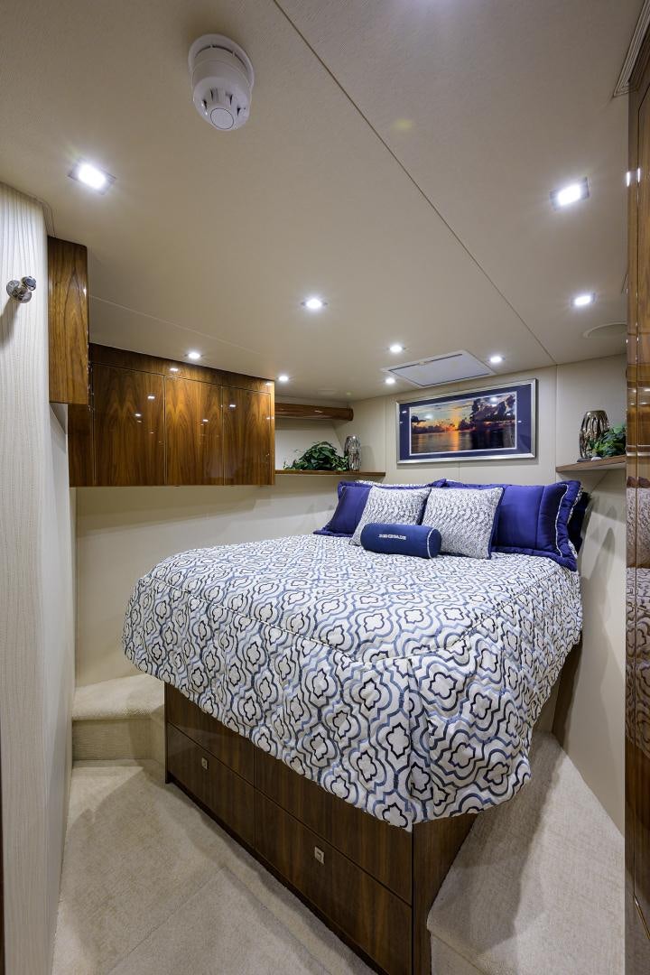 a bed in a room aboard Renegade Yacht for Sale