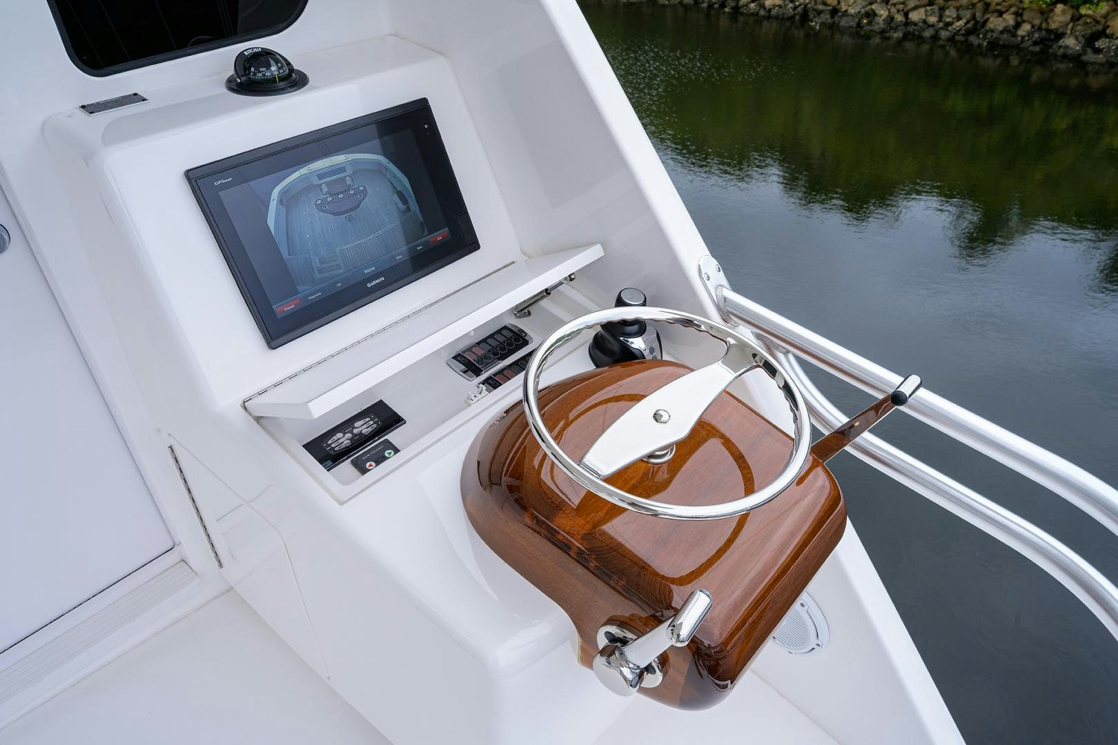 a boat with a television on the front aboard Renegade Yacht for Sale
