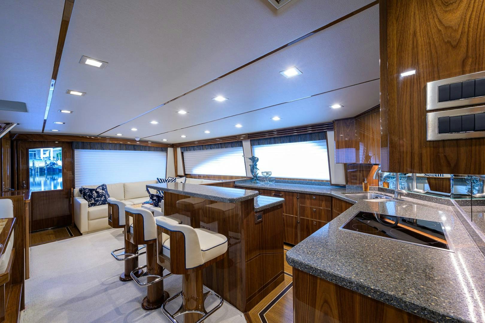 a kitchen with a bar and a bar aboard Renegade Yacht for Sale