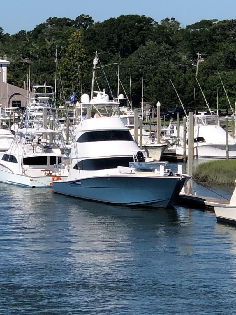 a group of boats are parked in a harbor aboard Renegade Yacht for Sale
