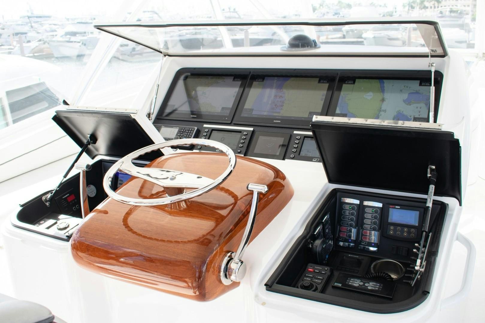 a car with a steering wheel aboard WONDER Yacht for Sale