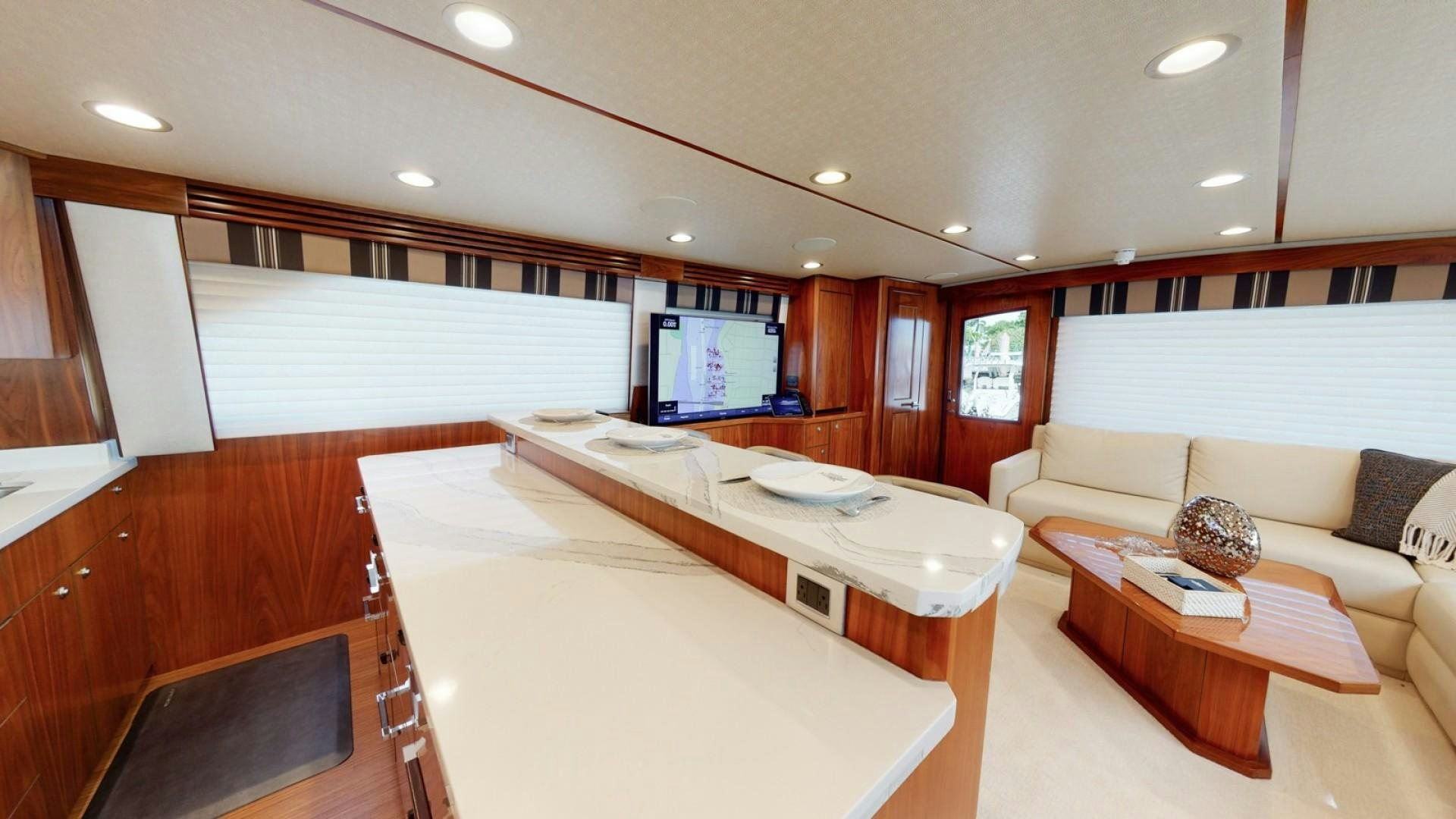 a room with a bed and a couch aboard WONDER Yacht for Sale