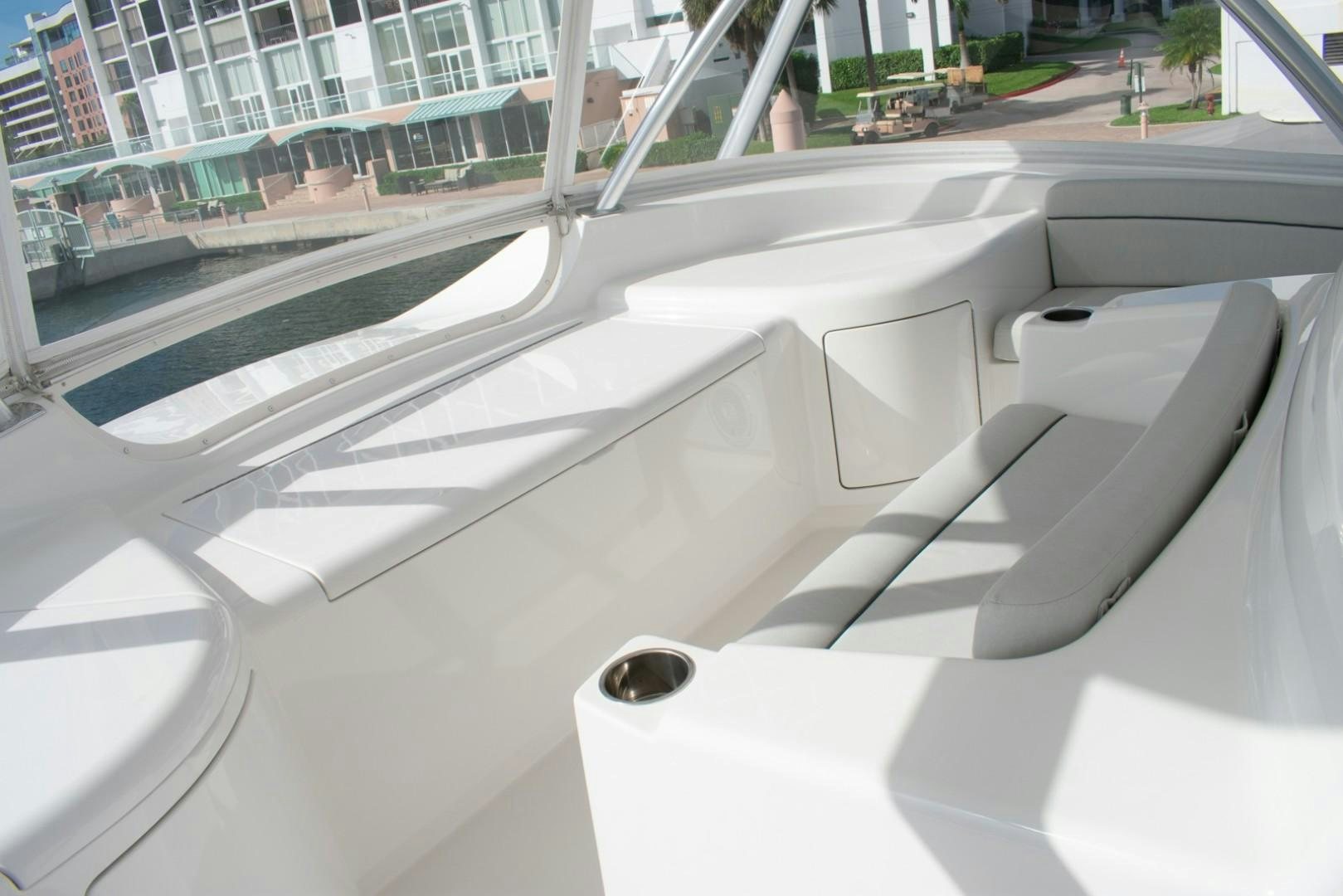a white car with a black seat aboard WONDER Yacht for Sale