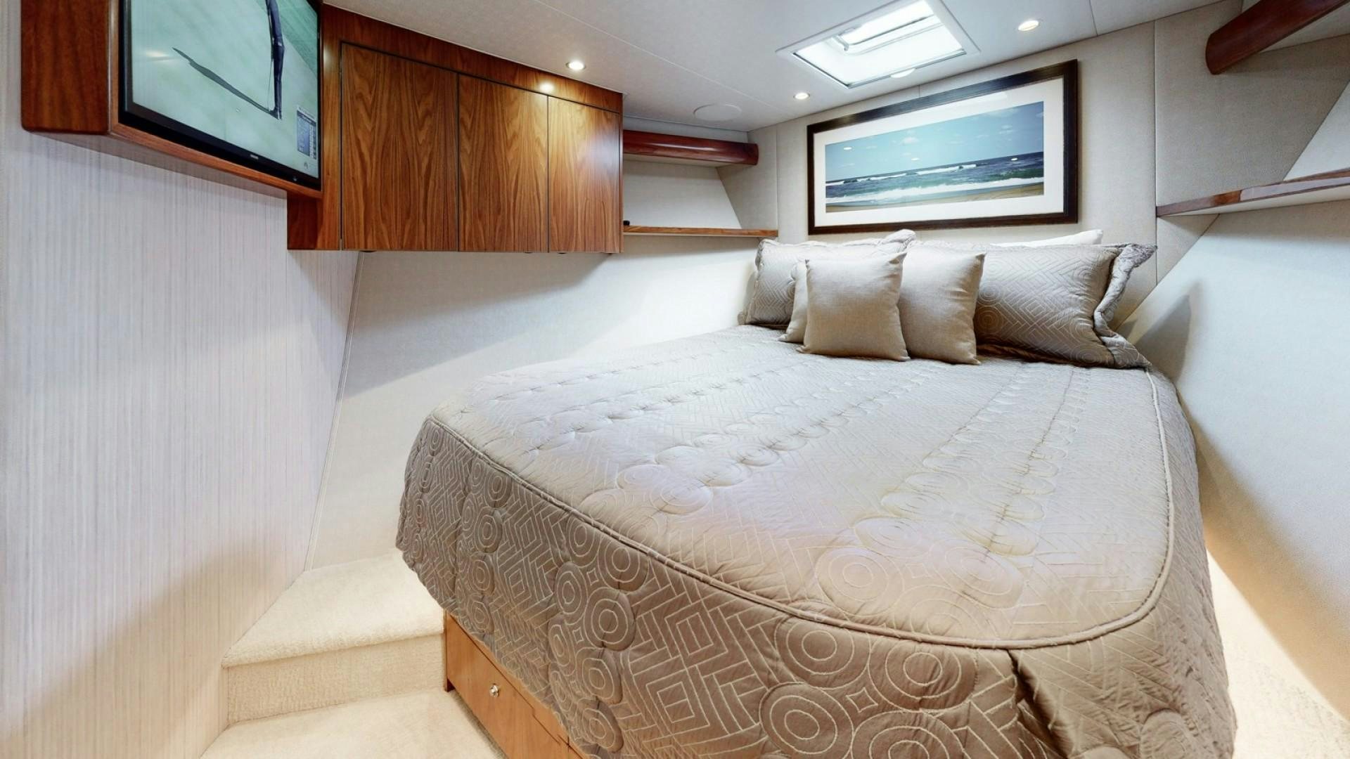 a bed with white sheets aboard WONDER Yacht for Sale