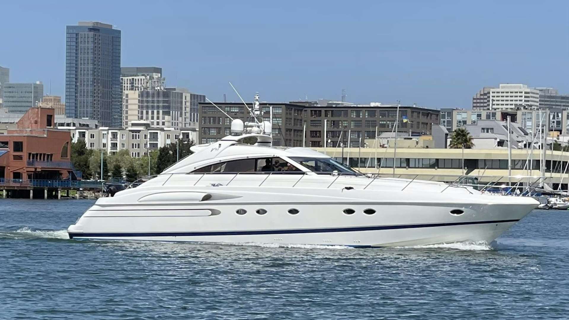 a white yacht in the water aboard Dismissed Yacht for Sale