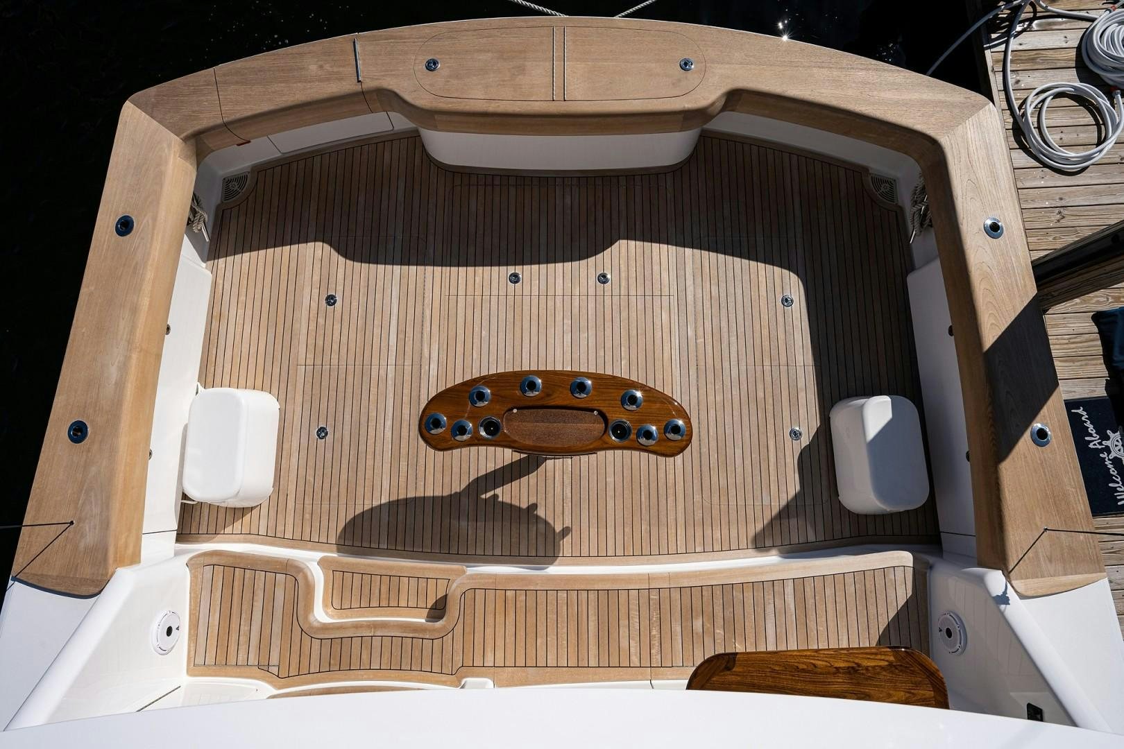 a wooden skateboard in a wooden box aboard REEL CRAZY Yacht for Sale
