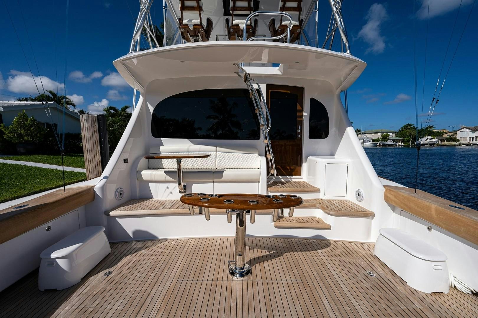 a white boat on a deck aboard REEL CRAZY Yacht for Sale