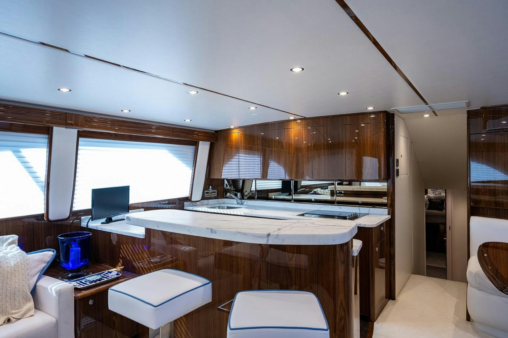 a room with a desk and a computer aboard REEL CRAZY Yacht for Sale