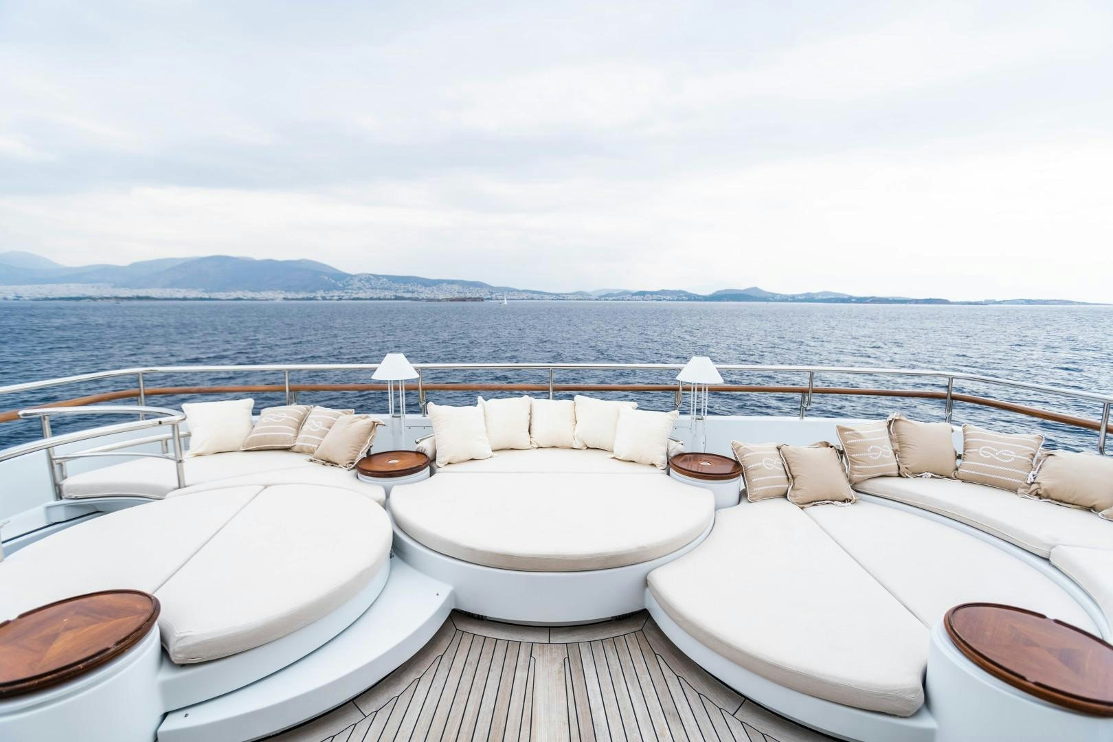 a room with a large bed and a large body of water aboard FARIBANA V Yacht for Sale