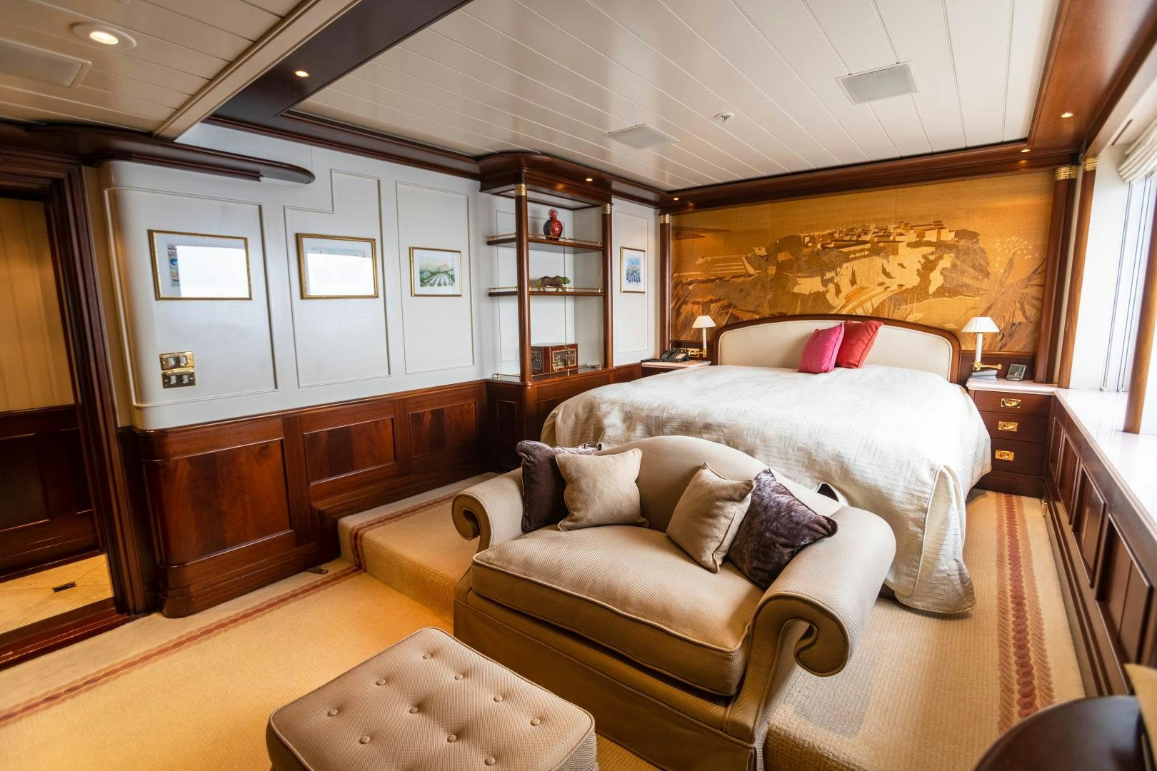 a living room with a couch and a bed aboard FARIBANA V Yacht for Sale