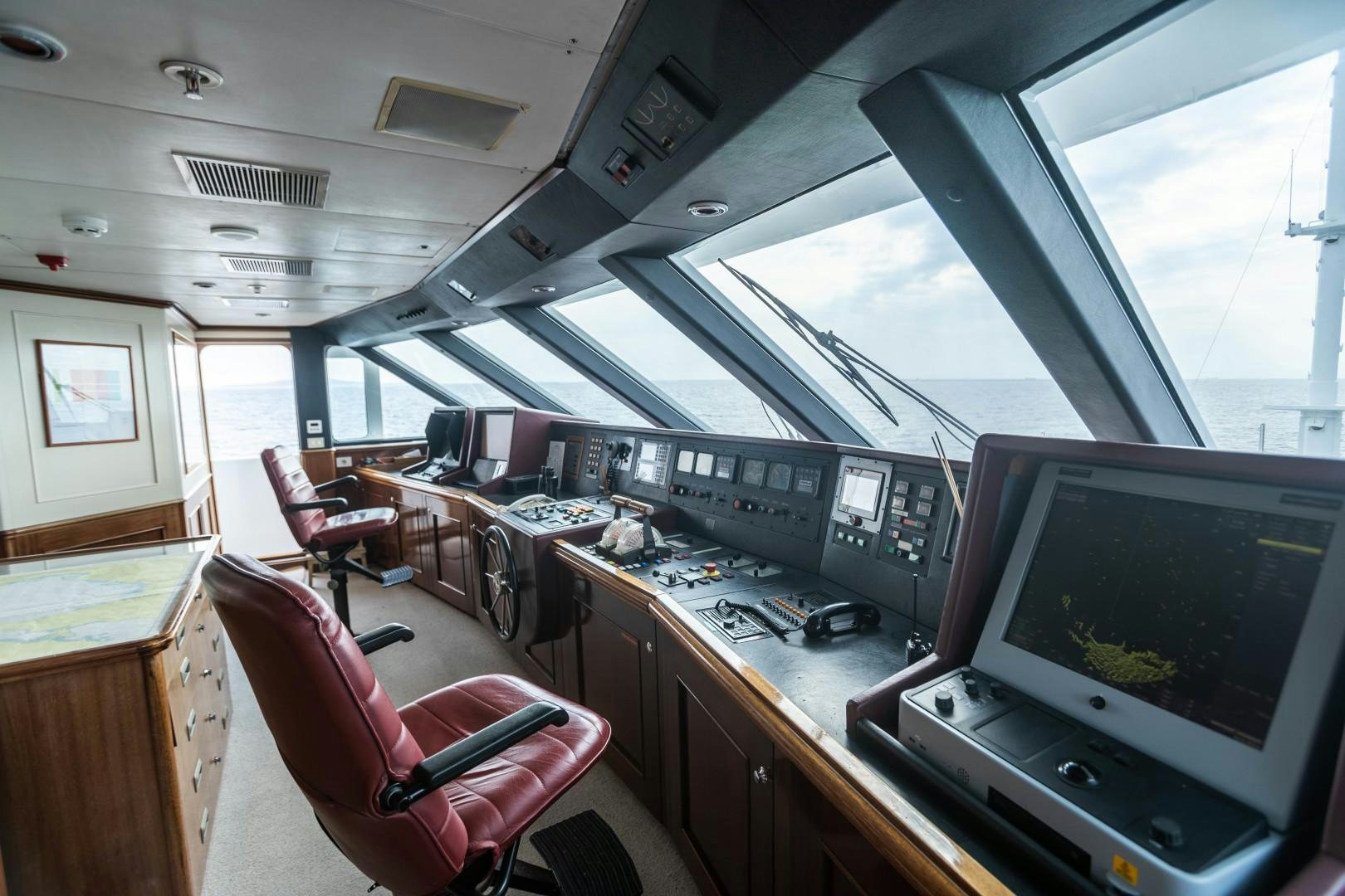 a room with a desk and a computer aboard FARIBANA V Yacht for Sale