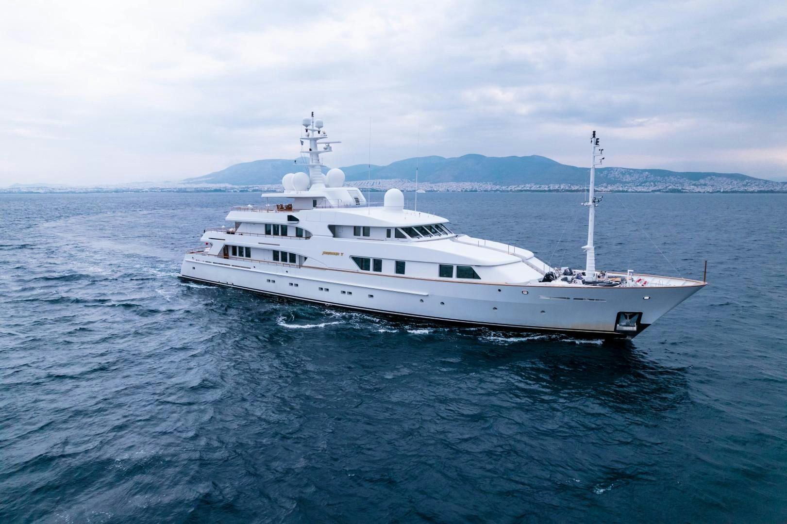 a white boat in the water aboard FARIBANA V Yacht for Sale