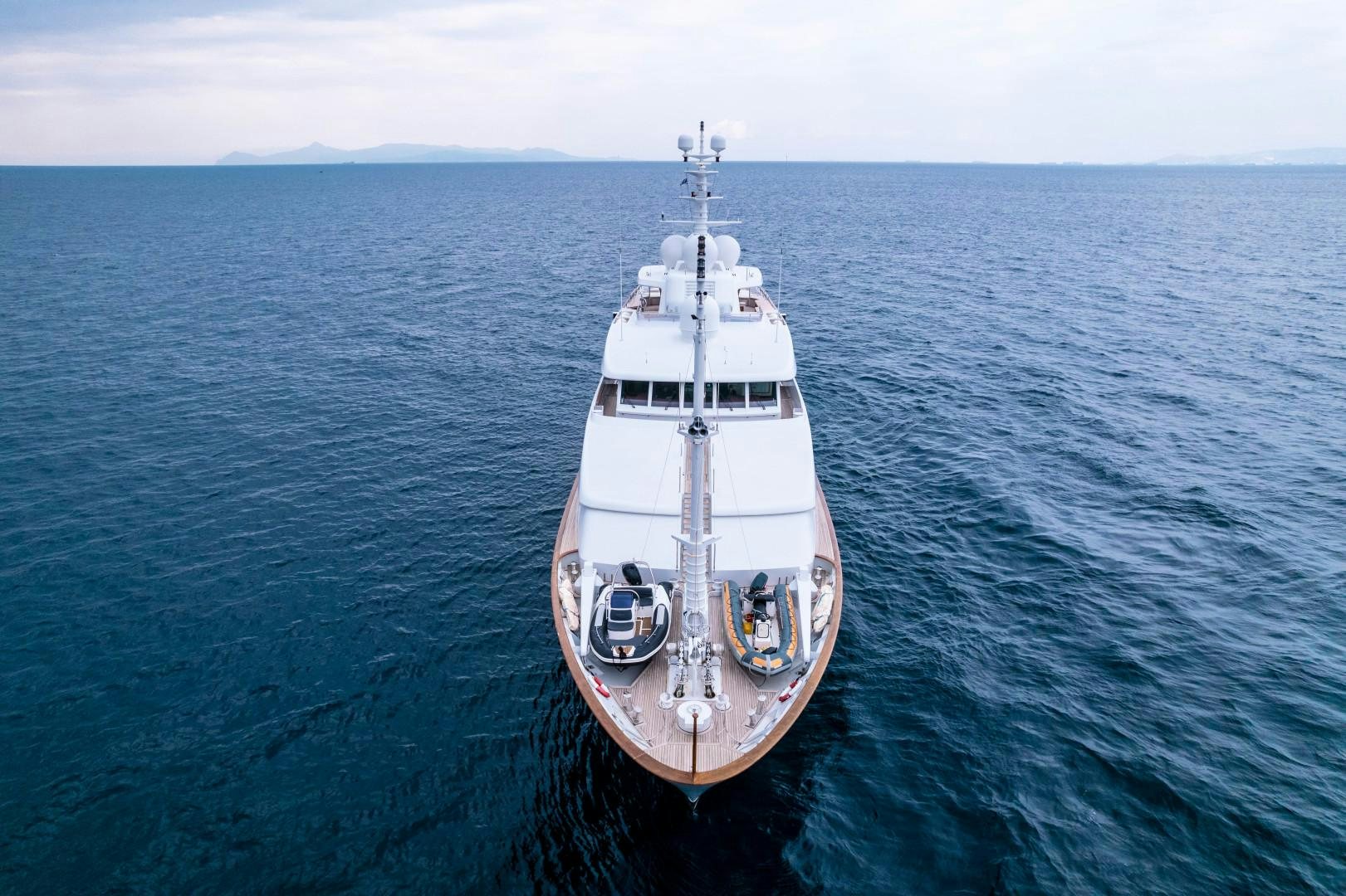 a white boat in the water aboard FARIBANA V Yacht for Sale
