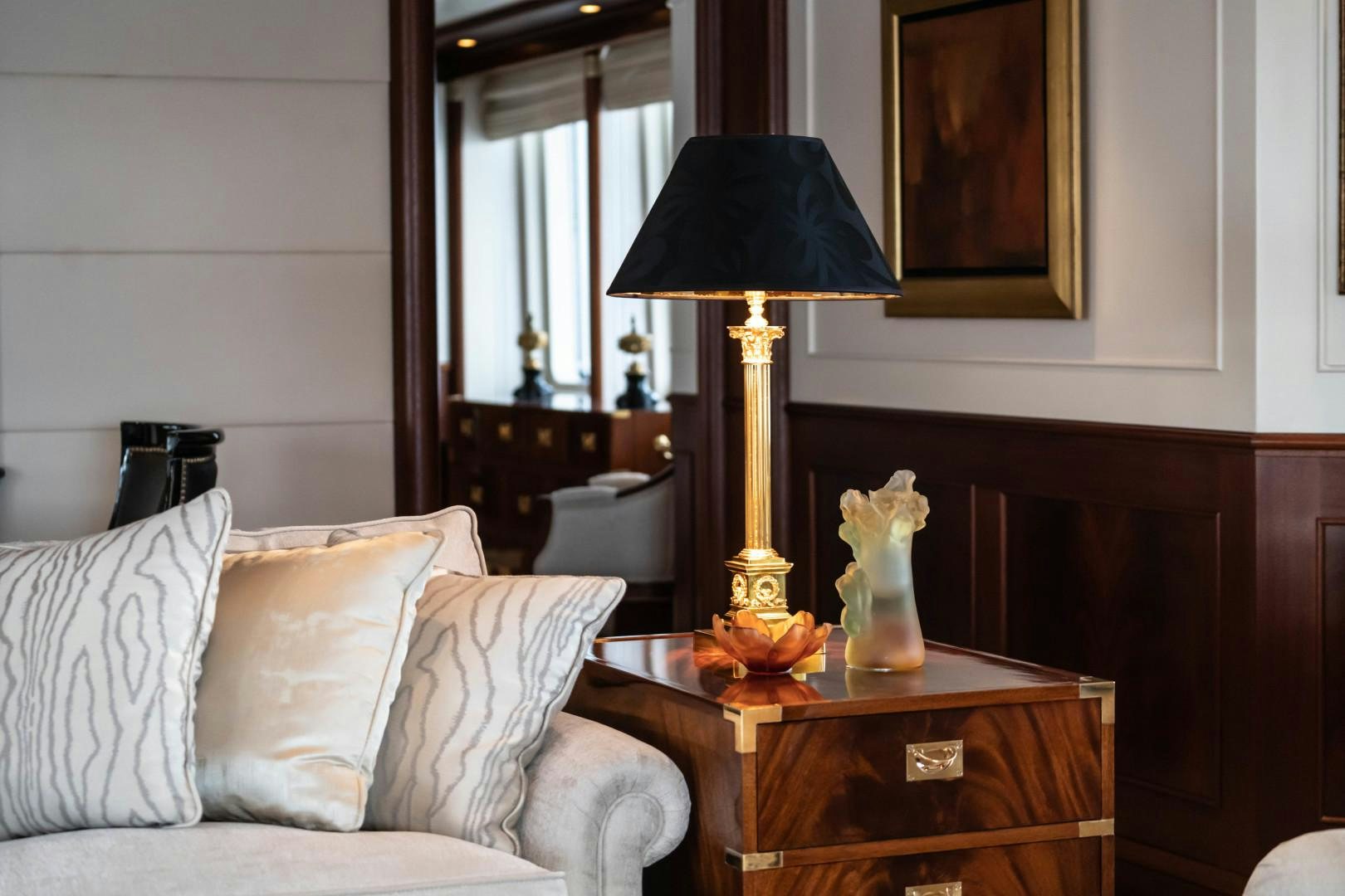 a lamp on a table aboard FARIBANA V Yacht for Sale
