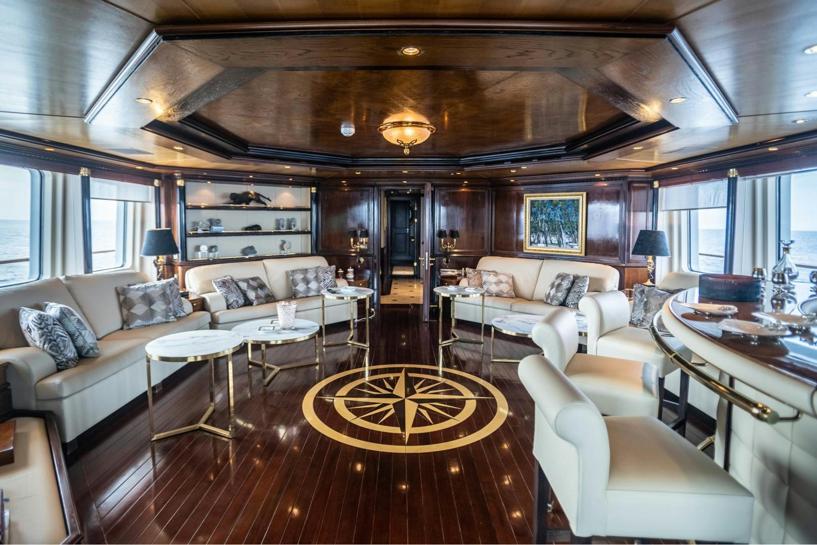 a living room with a large wood ceiling aboard FARIBANA V Yacht for Sale