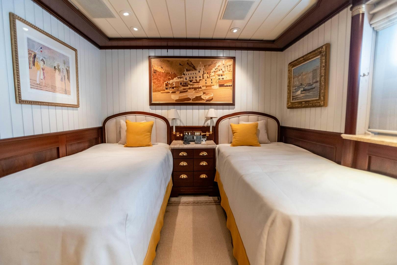 a couple of beds in a room aboard FARIBANA V Yacht for Sale