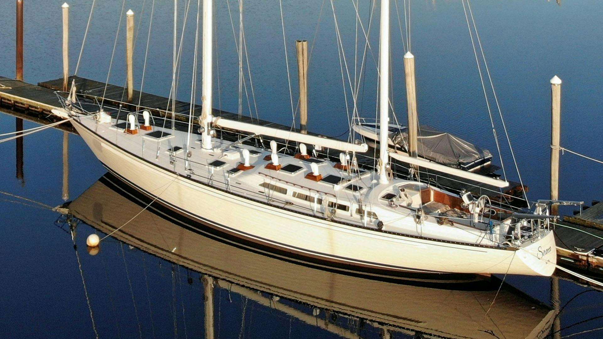 a large white boat aboard SIROCCO Yacht for Sale