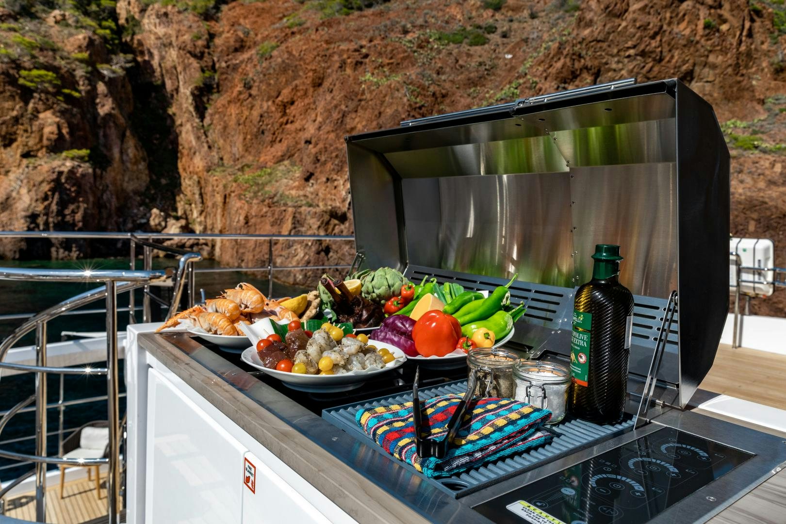 a table with food and drinks on it aboard JACOZAMI Yacht for Sale